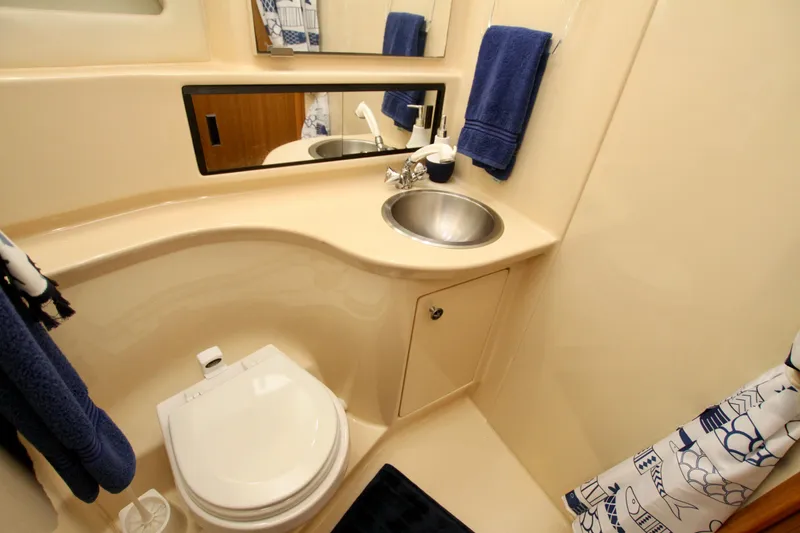Slide: The Image of Bathroom interior of 2002 Bayliner 3988 Command Bridge Motoryacht with sink and toilet. - 59
