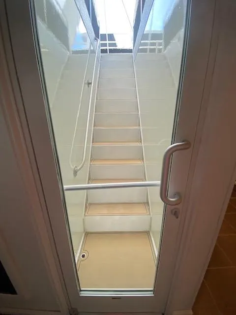 Slide: The Image of Staircase view through glass door on 2006 Fantasy Houseboat. - 27