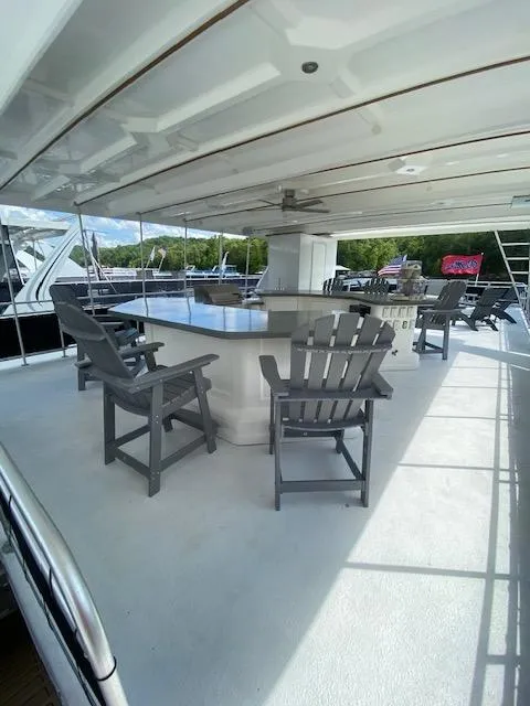 Slide: The Image of Spacious deck of a 2006 Fantasy houseboat with seating and scenic views. - 33