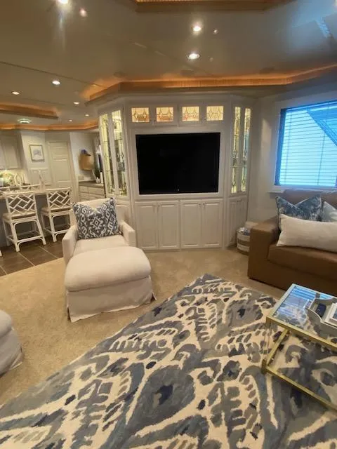 Slide: The Image of Luxurious 2006 Fantasy houseboat interior with elegant decor, plush seating, and modern entertainment center. - 4