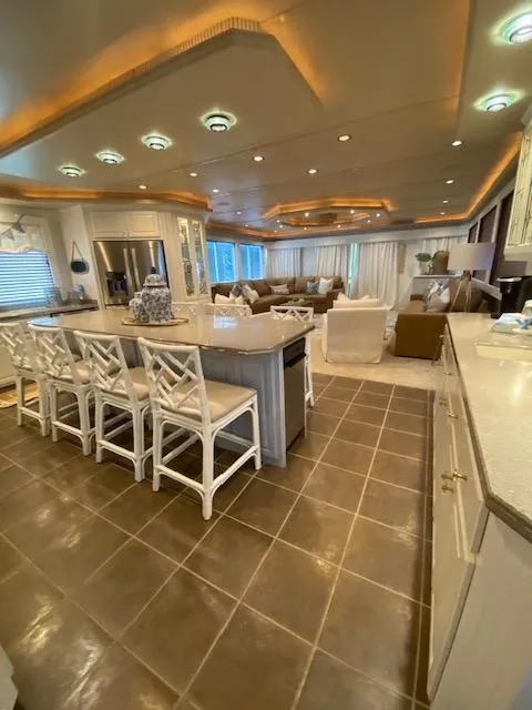 Slide: The Image of Luxurious 2006 Fantasy houseboat interior with modern kitchen and spacious living area. - 9