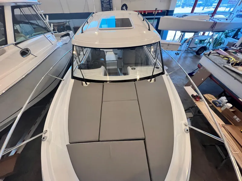 Slide: The Image of 2023 Beneteau Antares 8 boat in showroom, top view. - 31