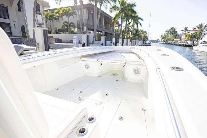 Slide: The Image of 2015 Yellowfin 32 Offshore boat interior with spacious seating and sleek design. - 21