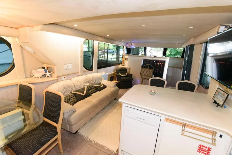 Slide: The Image of Luxurious interior of a 1997 Bluewater Yachts 680 Custom Series with modern furnishings. - 19