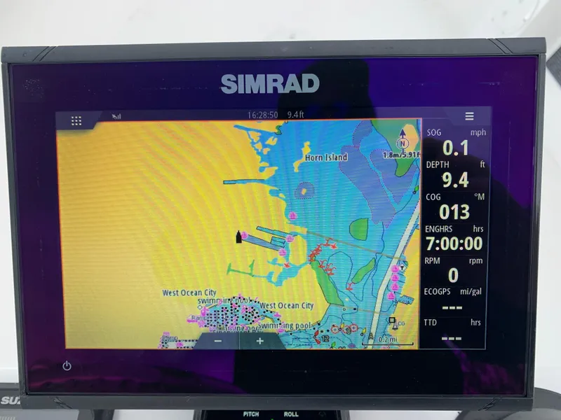 Slide: The Image of Simrad marine GPS display showing navigation map near Horn Island, 2022 Judge 22 Shoreman. - 18