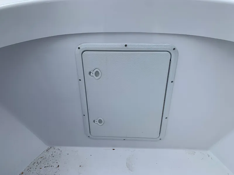 Slide: The Image of Hatch on 2022 Judge 22 Shoreman boat, featuring a clean, white surface. - 26