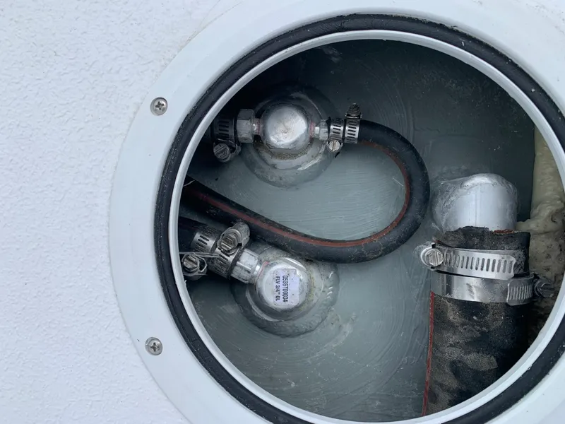 Slide: The Image of Close-up of plumbing components in a 2022 Judge 22 Shoreman boat. - 39