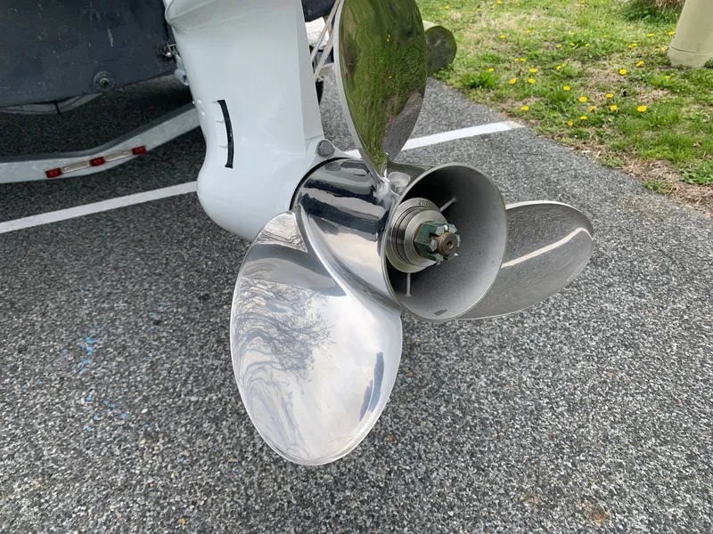 Slide: The Image of Close-up of a 2022 Judge 22 Shoreman boat propeller on asphalt. - 43