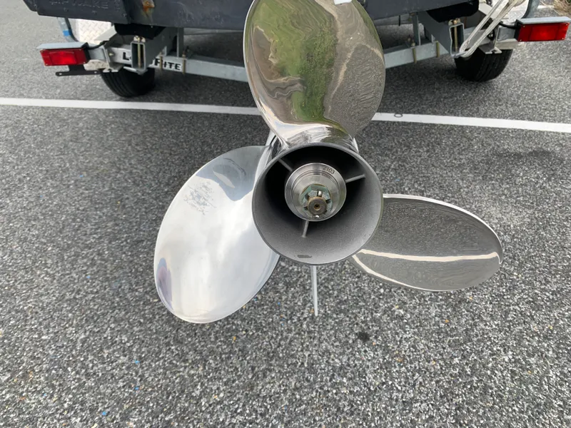 Slide: The Image of Close-up of a 2022 Judge 22 Shoreman boat propeller on a trailer. - 44