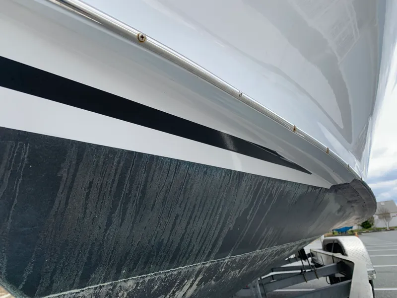 Slide: The Image of Close-up of 2022 Judge 22 Shoreman boat hull on trailer. - 49