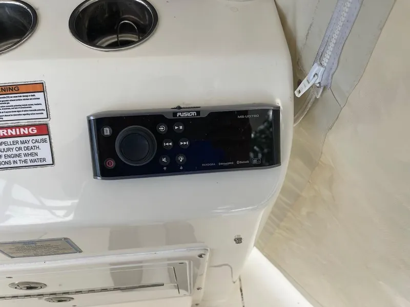 Slide: The Image of Fusion marine stereo system on 2015 Cobia 344 Center Console boat. - 7