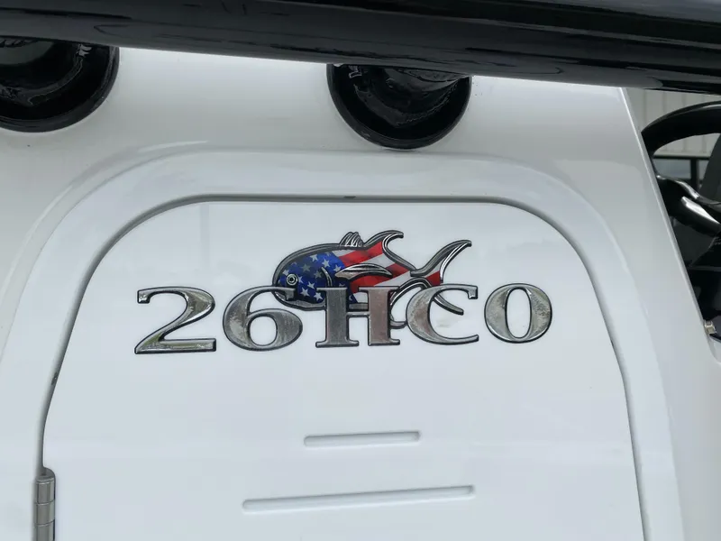 Slide: The Image of 2022 Crevalle 26 HCO boat logo with American flag fish design. - 11