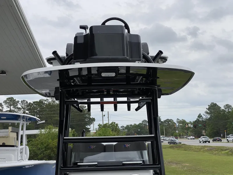 Slide: The Image of 2022 Crevalle 26 HCO boat with elevated helm station. - 14