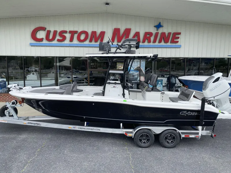 Slide: The Image of 2022 Crevalle 26 HCO boat on trailer at Custom Marine dealership. - 3