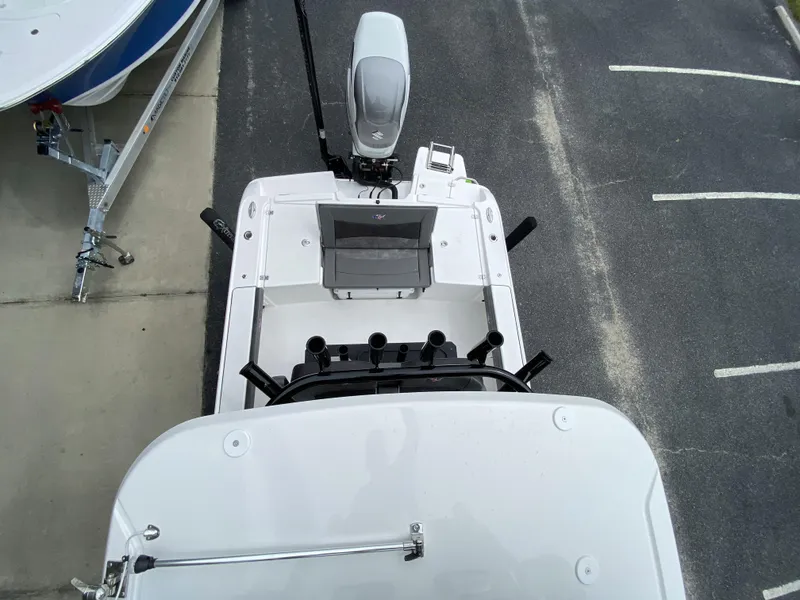 Slide: The Image of 2022 Crevalle 26 HCO boat, aerial view of the deck and motor. - 42