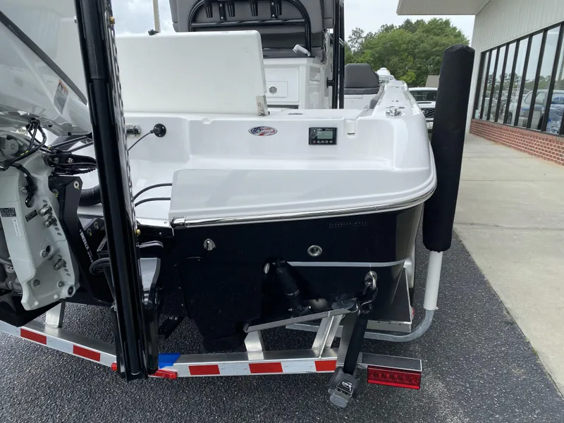 Slide: The Image of 2022 Crevalle 26 HCO boat rear view on trailer. - 7