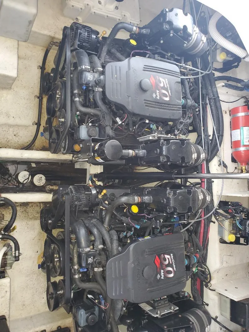 Slide: The Image of Engine compartment of 2007 Sea Ray 290 Sundancer with twin 5.0 engines. - 9