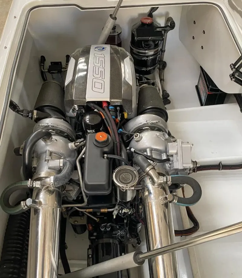 Slide: The Image of Engine compartment of a 2016 MTI 52' Pleasure boat showing a powerful engine. - 10