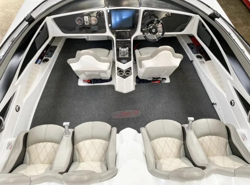 Slide: The Image of 2016 MTI 52' Pleasure boat interior with modern dashboard and seating. - 3