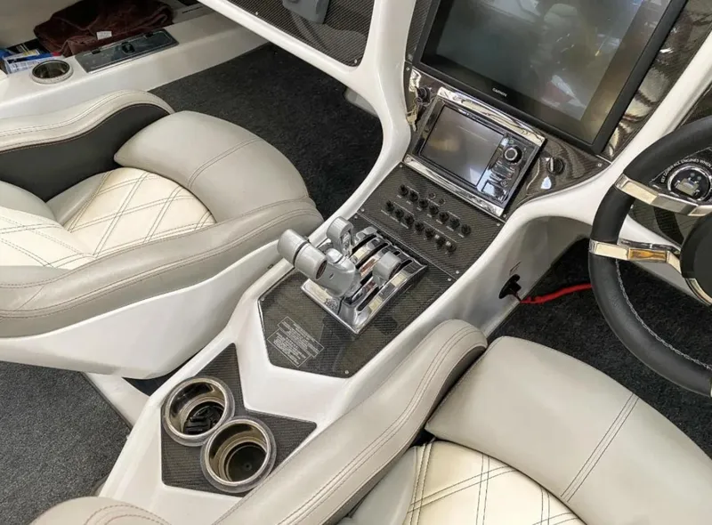 Slide: The Image of 2016 MTI 52' Pleasure boat cockpit with luxurious leather seats and advanced control panel. - 4