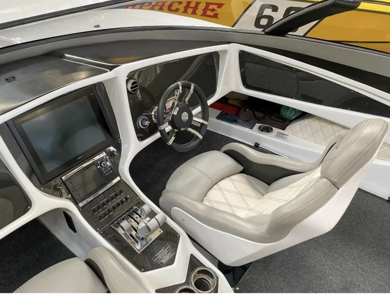 Slide: The Image of 2016 MTI 52' Pleasure boat cockpit with modern controls and luxurious seating. - 5