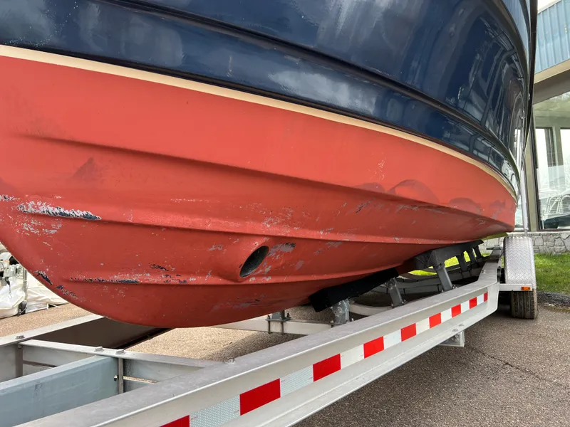 Slide: The Image of 2013 Ranger Tugs R-27 boat on trailer, showing hull condition. - 19