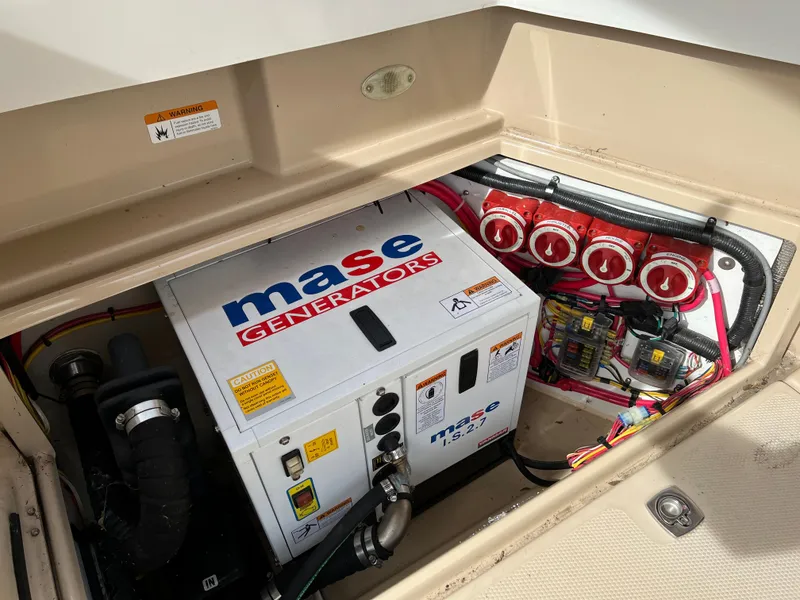 Slide: The Image of Mase generator in 2013 Ranger Tugs R-27 boat compartment. - 29