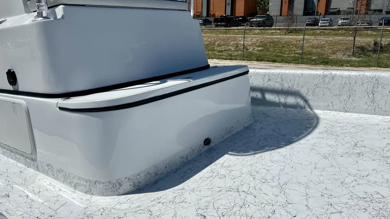 Slide: The Image of 2023 Dargel KAT 250 DX boat deck with white and black detailing. - 10