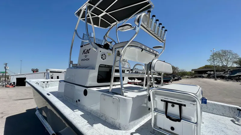 Slide: The Image of 2023 Dargel KAT 250 DX boat with T-top and rod holders. - 18