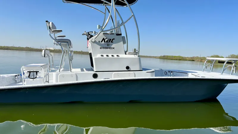 Slide: The Image of 2023 Dargel KAT 250 DX boat on calm water. - 43