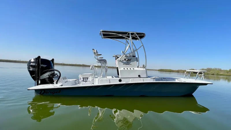 Slide: The Image of 2023 Dargel KAT 250 DX boat on calm water. - 44