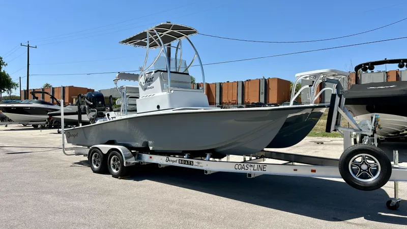 Slide: The Image of 2023 Dargel KAT 250 DX boat on a trailer in a parking lot. - 7