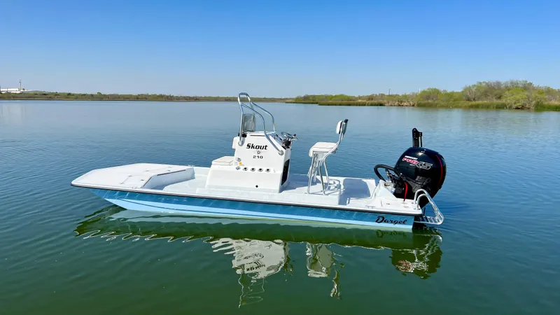 Slide: The Image of 2023 Dargel Skout 210 boat on calm water. - 42