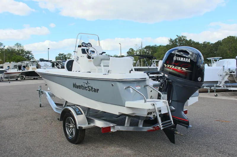 Slide: The Image of 2022 NauticStar 195 XTS boat with Yamaha VMAX engine on trailer. - 10
