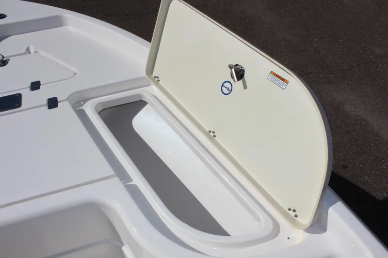 Slide: The Image of Open storage compartment on 2022 NauticStar 195 XTS boat. - 25