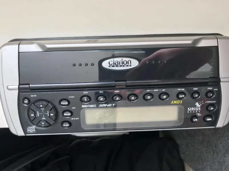 Slide: The Image of Clarion Marine XMD3 stereo system on 2003 Sea Ray 240 Sundeck boat. - 8