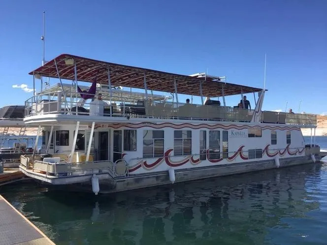 Slide: The Image of 2004 Sumerset Kapalua Share #13 houseboat docked on a sunny day. - 0