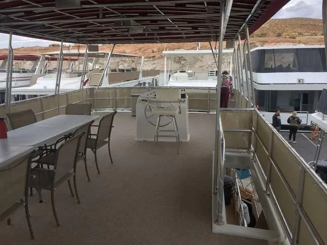 Slide: The Image of Upper deck of 2004 Sumerset Kapalua Share #13 houseboat with seating and helm station. - 1