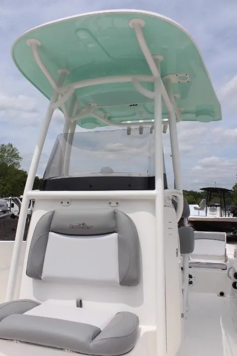 Slide: The Image of 2023 NauticStar 231 Hybrid boat with T-top and seating. - 14