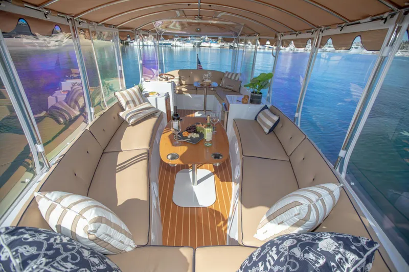 Slide: The Image of Luxurious 2026 Duffy Bay Island boat interior with plush seating and elegant decor. - 1