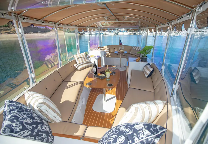 Slide: The Image of Luxurious 2026 Duffy Bay Island boat interior with elegant seating and scenic water views. - 3