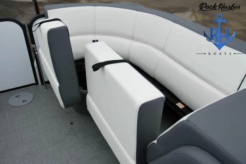 Slide: The Image of 2022 Manitou RF 23 Aurora LE VP II boat interior with white and gray seating. - 11