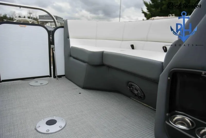 Slide: The Image of 2022 Manitou RF 23 Aurora LE VP II boat interior with white and gray seating. - 4