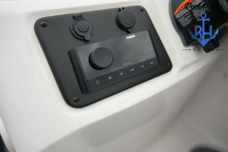 Slide: The Image of Control panel of 2022 Manitou RF 23 Aurora LE VP II boat with Fusion stereo system. - 7