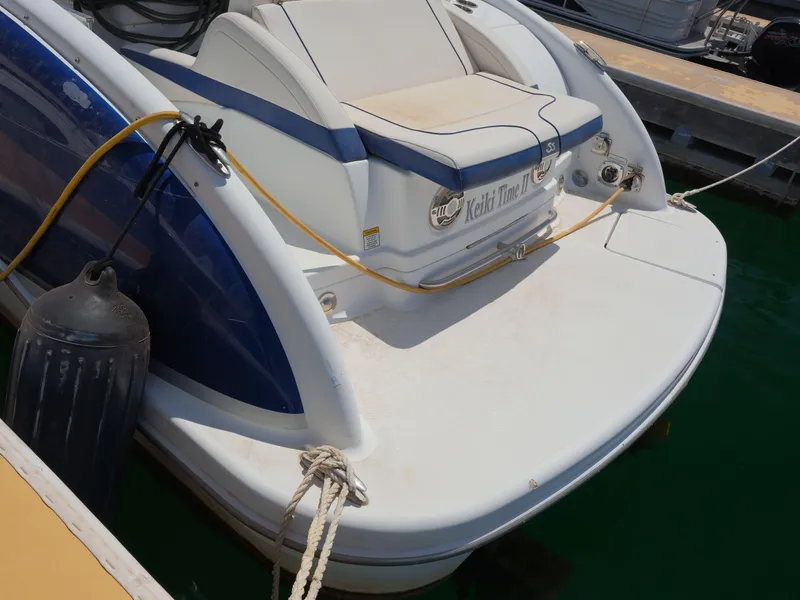 Slide: The Image of 2012 Formula 310 Sun Sport boat docked at marina. - 14