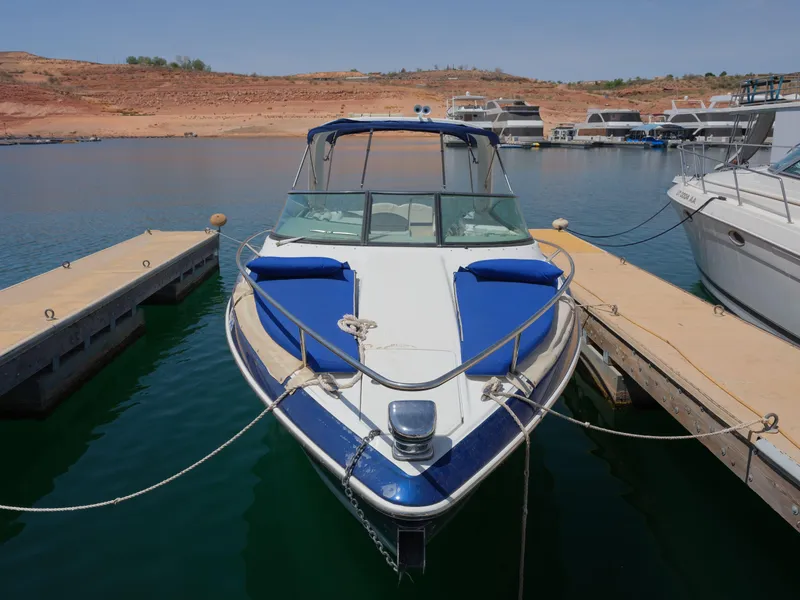 Slide: The Image of 2012 Formula 310 Sun Sport boat docked at a marina. - 20