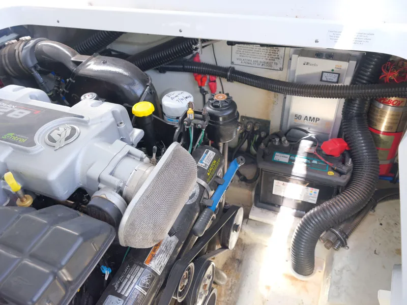 Slide: The Image of Engine compartment of a 2012 Formula 310 Sun Sport boat. - 27