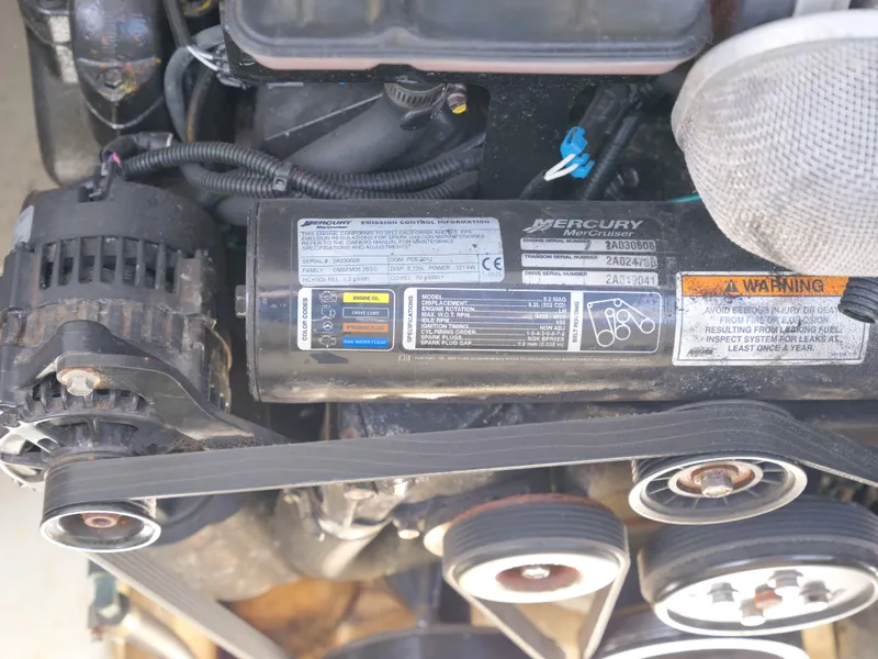 Slide: The Image of 2012 Formula 310 Sun Sport engine close-up with Mercury Marine components. - 29