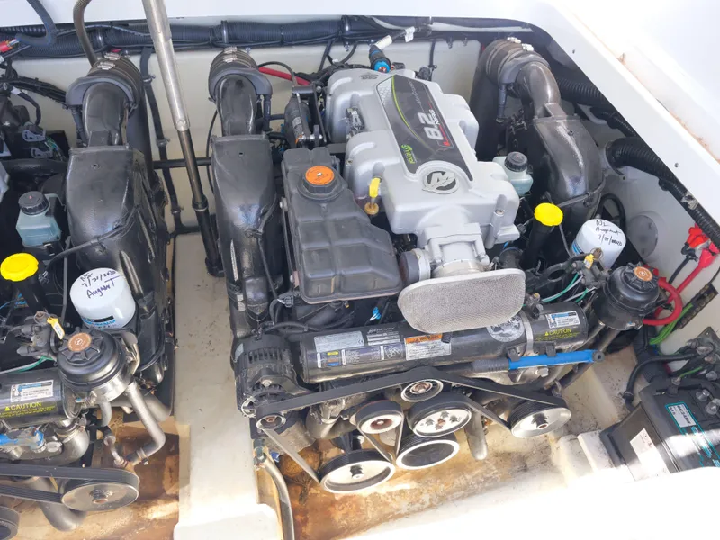 Slide: The Image of 2012 Formula 310 Sun Sport engine compartment with twin engines. - 30