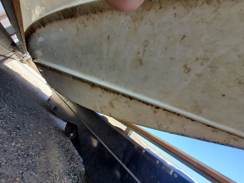 Slide: The Image of Close-up of the hull of a 2012 Formula 310 Sun Sport boat on a trailer. - 34